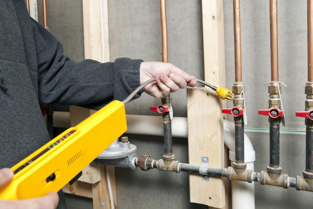 gas leak detector in use