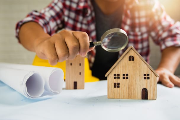 home inspector looking at home