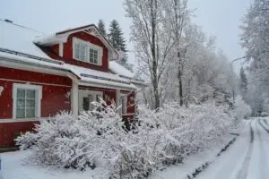 a house with snow on the ground