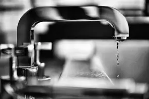 a water dripping from a faucet