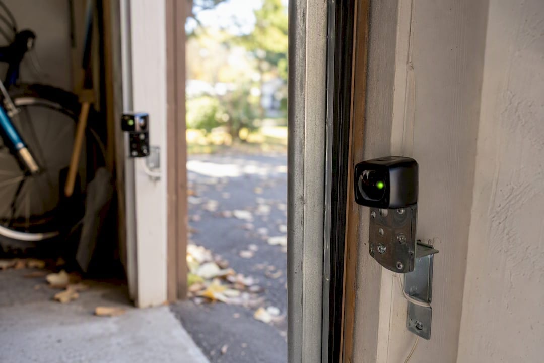 Close-up of aligned garage door safety sensors