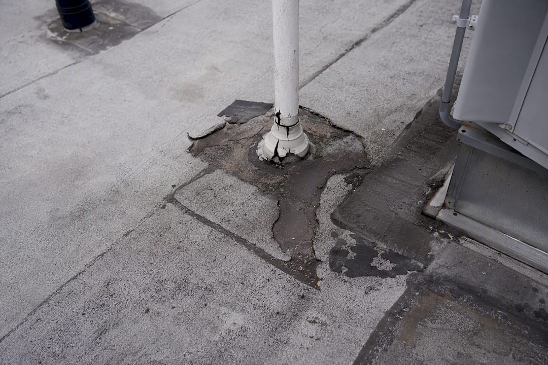 Flashing failure at HVAC rooftop penetration