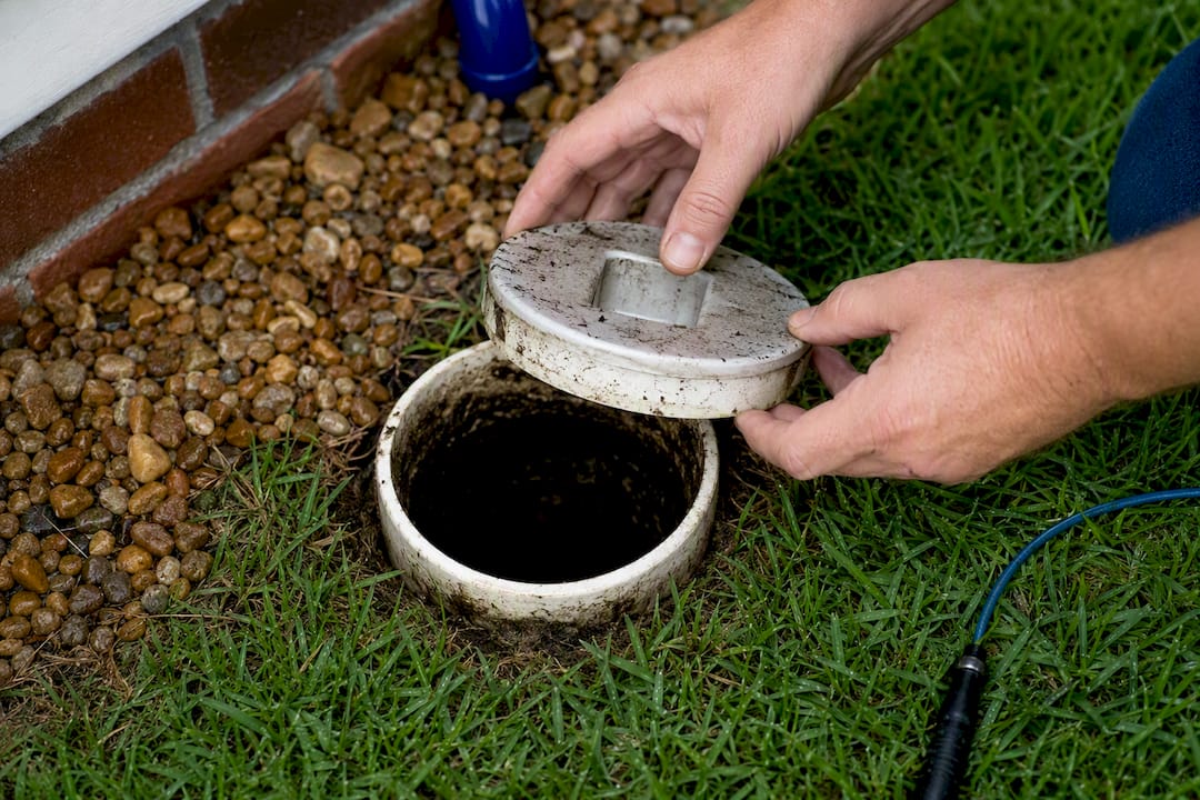 Sewer cleanout opened for inspection