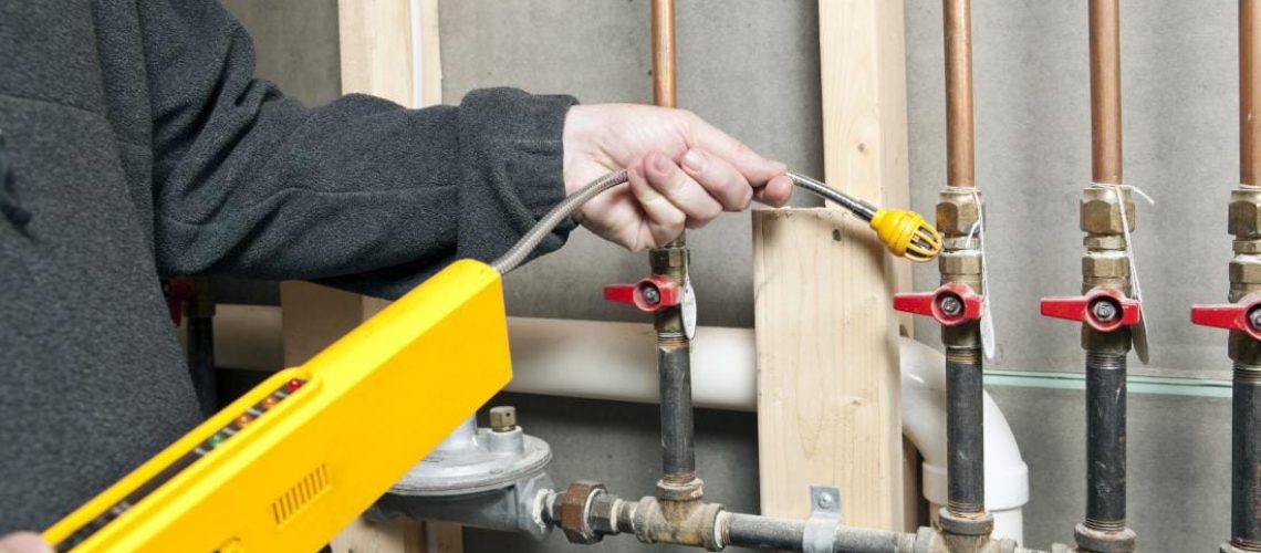 gas leak detector in use