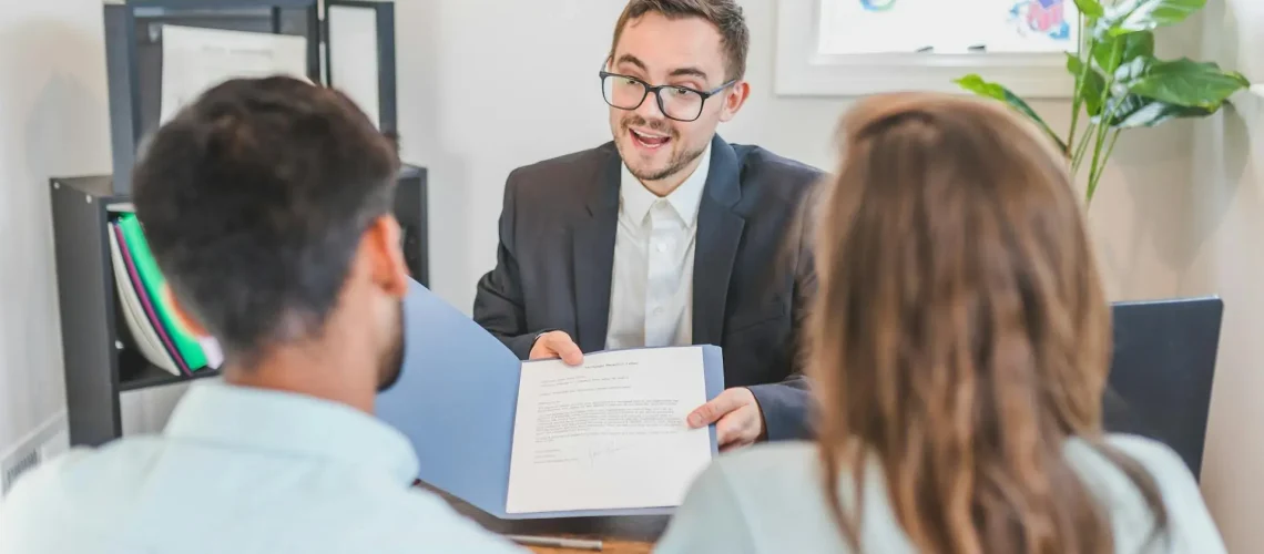 Photo of agent with sellers disclosure statement