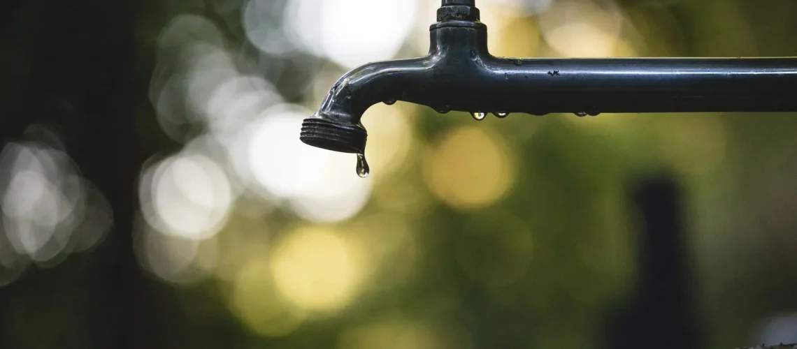 a water dripping from a faucet